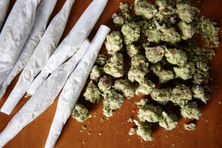 Despite warning, Trump signs executive order reclassifying marijuana as a less dangerous drug​